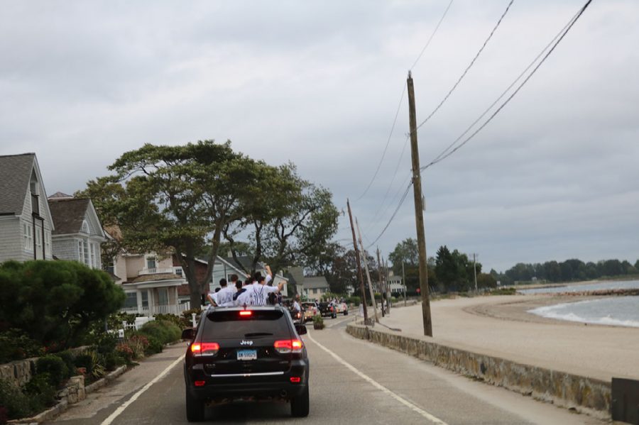 Motorcade unites class of 2019 in final ride to homecoming