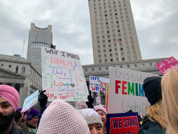 Participants of the 2019 Women’s March on New York City hold signs and march to protect their rights and promote equality.