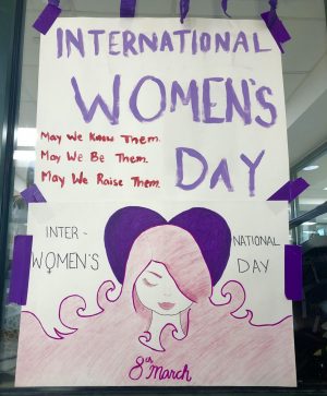 Students in Women in History encouraged their peers to partake in activities for International Women's Day, including wearing purple to school and answering various true or false questions.