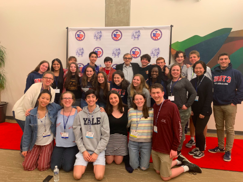 Staples’ We The People class poses with John Tinker of the landmark Supreme Court case Tinker v Des Moines, which extended students’ freedom of speech.  