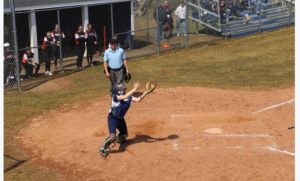 Jen Westphal ’22 makes a play at home plate. She is one of three freshman on the Staples varsity softball team.
