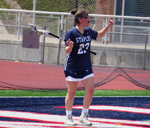 Shira Parower 21 looks to set up a play during the game. 