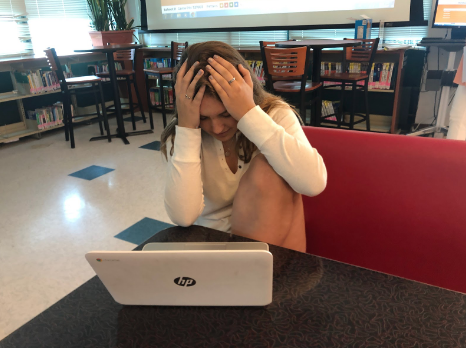 As finals approach Claire Fisher’22 crams for her multiple tests. She is stressed but excited for the end of the year to come. 