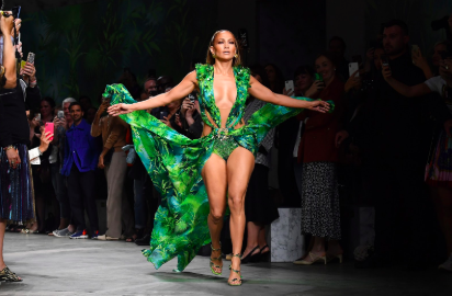 Jennifer Lopez walks in the Versace show wearing the same dress she wore 20 years ago that resulted in the creation of google images. 