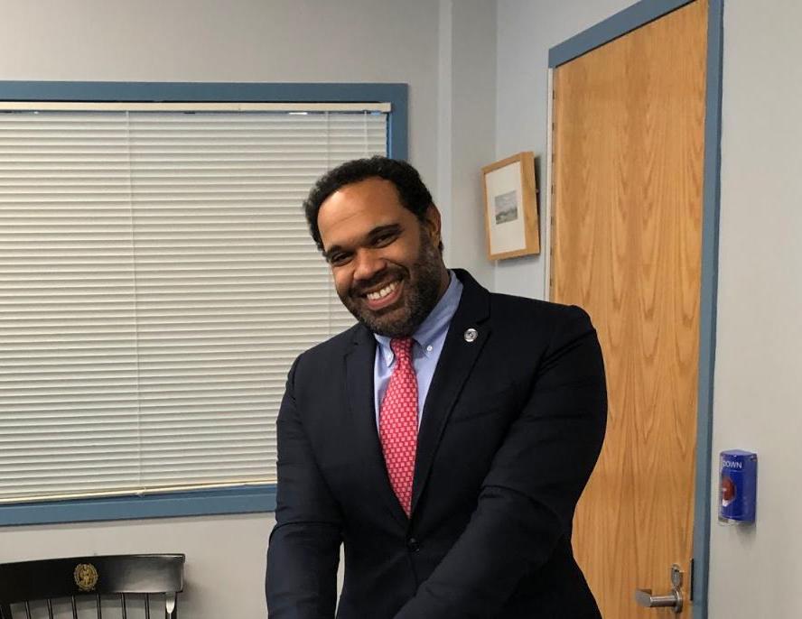 Principal Thomas smiling after chatting about connections. He explains the aspect of building relationships and getting information out to students easily and efficiently is what connections are all about.