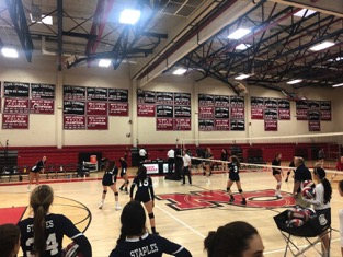  Staples girls’ volleyball warms up for the game against New Canaan starting with their blocking routine and then moving into a passing drill, coached by John Shepro and Brendan Giolitto.
