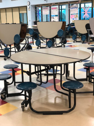 The senior section of the cafeteria sits empty during free period while many decide to stay at home during senior skip day. 