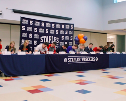 This year, 12 Staples seniors committed to a multitude of NCAA Division 1 colleges, from Ivy Leagues to small liberal arts schools. Joined by family members, teammates and coaches, they signed their letters at the Staples cafe on Feb. 5, 2020. 