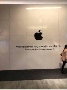 Prior to the new Apple store opening, the vast space it took up was covered by a big white wall, many customers stopped and pointed acknowledging the store.