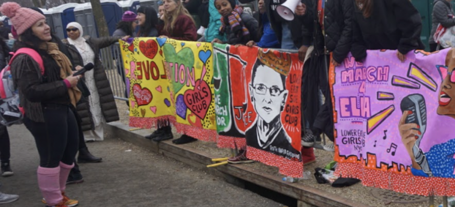 A Ruth Bader Ginsburg drawing and quote is painted on a banner at the 2017 Women’s March in Washington.  Justice Ginsburg, who passed away on Sept. 18, served as a cultural and political icon for many aspiring politicians.
