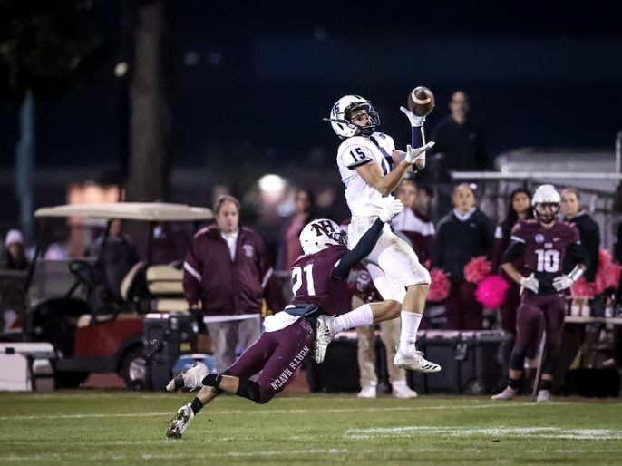 Jake Thaw ’20 playing football as a Staples Wrecker. 