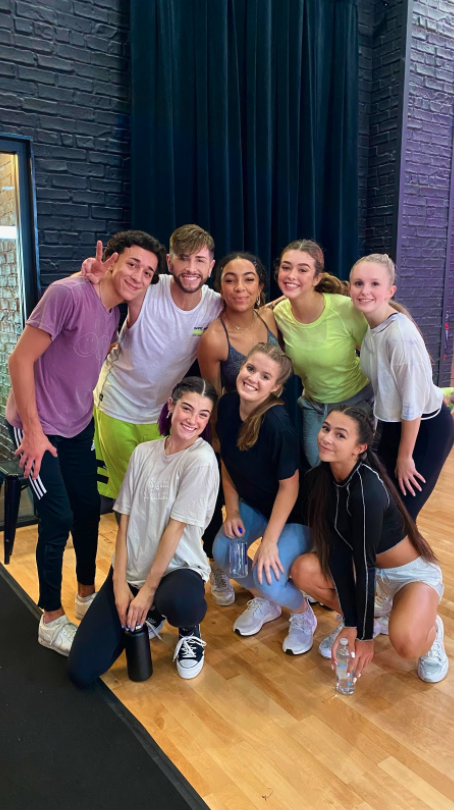  Kaitlyn Constantino ’21 (far right) was one of six dancers chosen to dance along Tik Tok star Charli D’Amelio. Constantino’s trip to film the virtual dance class included a coronavirus test as well as daily temperature checks to ensure they could dance in the studio without masks.