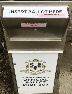 To reduce the potential for COVID-19 spread from in-person voting, many are choosing to vote with absentee ballots. Ballots are mailed in or dropped off in-person in official ballot drop boxes. One is located in the back of Westport’s Town Hall. 
