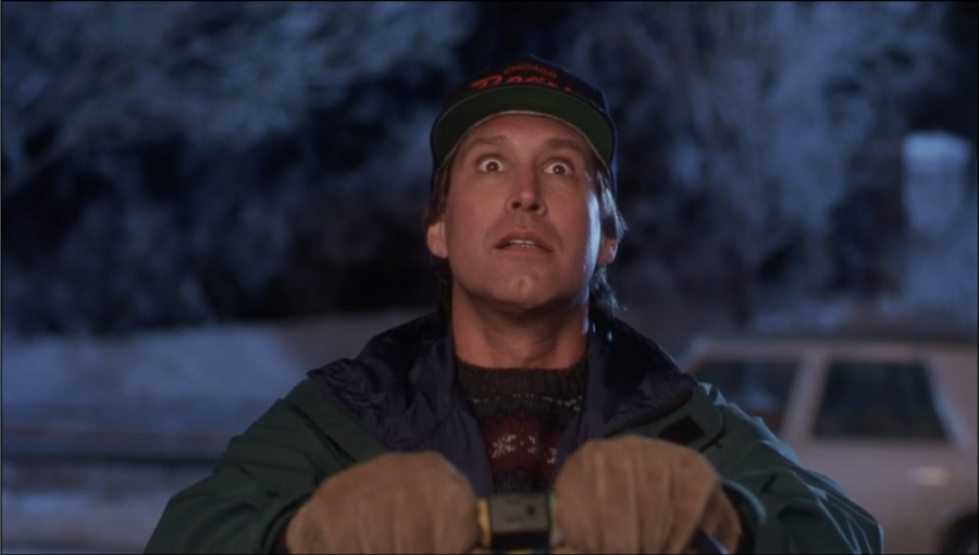 Chevy+Chase%E2%80%99s+Clark+Griswold+decks+his+house+in+Christmas+lights%2C+as+part+of+his+plan+to+have+the+perfect%2C+good+old-fashioned+family+Christmas.