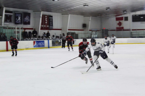 Captain Victor Sarrazin ’21 on a 1-on-1 breakaway with the goalie.