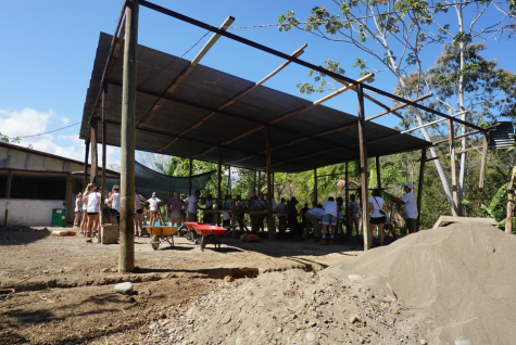 February Trip 2020. Students in one group traveled to Costa Rica where they built a learning center in the town of Boruca. This photo is from the beginning of the process where students are sectioned off in little groups to mix cement and stack building blocks. 