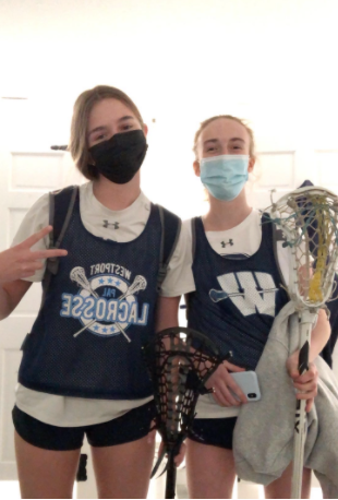 Shannon Lynch ‘23 and Caroline Cooper ‘24 prepare for the second week of girls’ lacrosse pre-season.