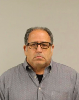 Michael Newman, 61, was arrested Friday May 21, after a warrant was made for his arrest regarding child pornography. 