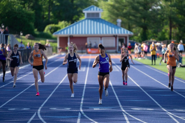 Staples+girls%E2%80%99+track+placed+and+scored+in+several+events+at+FCIACs+on+May+24.+This+is+their+first+time+placing+in+six+years.+They+hope+to+further+qualify+in+States+and+States+Open+in+the+upcoming+weeks.+