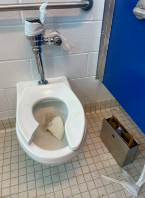 The girls second floor bathroom was vandalized on Sept. 23. The perpetrator(s), who has not yet been identified, peeled paint off the stall walls, broke the toilet seat and drew a sexually explicit image on the stall door.