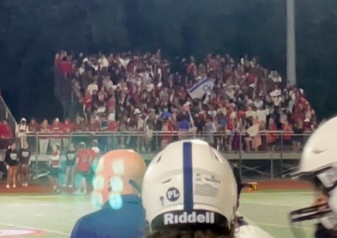 Cheshire High School’s fan section waved an Israeli flag during the football game versus Staples on Sept. 24. 