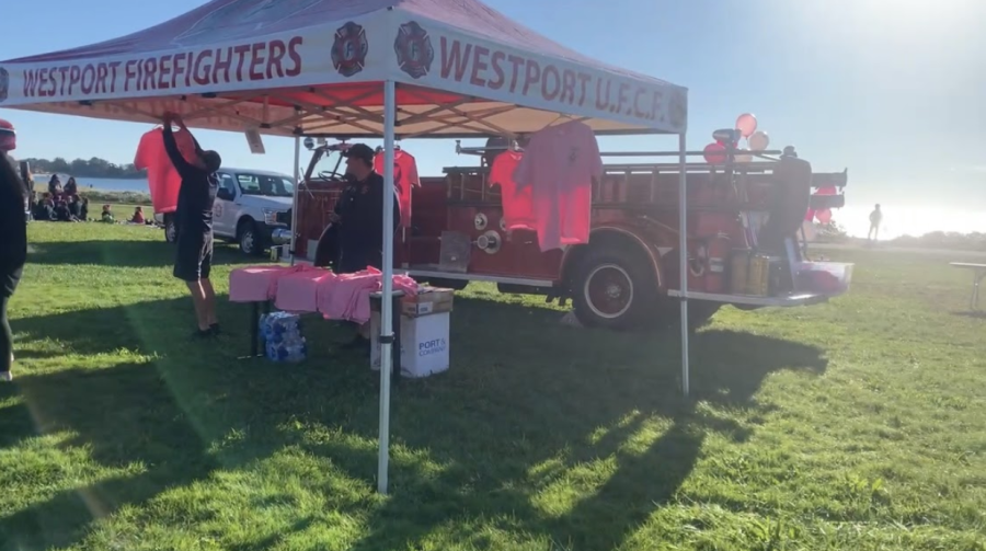 Several Westport groups such as the firefighters support the walk. A variety of booths that offer food and merchandise that donate their profit to support breast cancer.