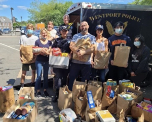 Nikhil Arora ’22 and members of Team Westport collecte perishable food items and bags of groceries for the Gillespie Center, a local emergency shelter.

