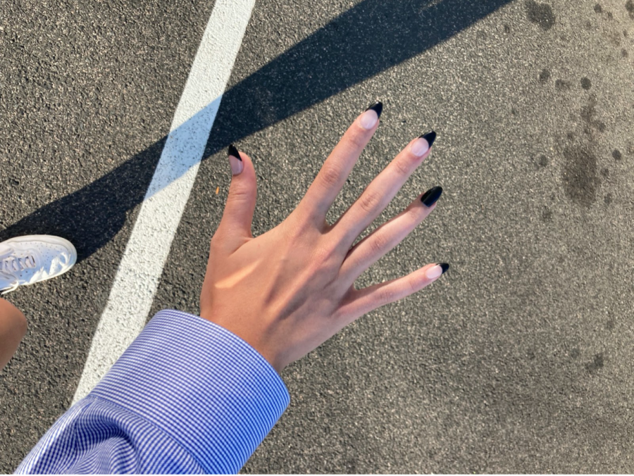 Acrylic nails prove to be fun contributions to one’s fashion at the expense of nail health and one’s savings. Above is a particularly popular acrylic nail design involving almond shaped nails and french tips.