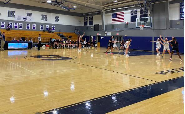 The Staples girls’ basketball team on defense against Stamford. Stamford was able to beat the Staples defense to bring the score to 15-22 in the third quarter.