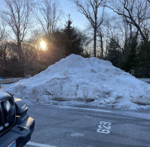 Snow in parking spots has been an issue all winter for seniors. Snow banks are formed from snow plows, which can take weeks to melt. The snow bank in the picture is blocking three parking spots, leaving seniors to find other places to park. 