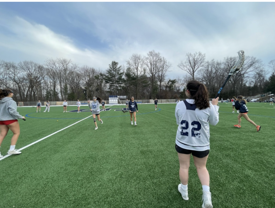 The Staples girls’ lacrosse team practices basic stick drills at Ginny Parker after school for two hours as part of their preseason training. 