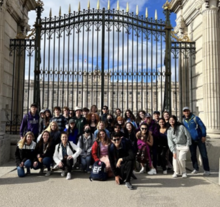 The Staples group of students stand in front of the gate to the Royal Palace in Madrid.