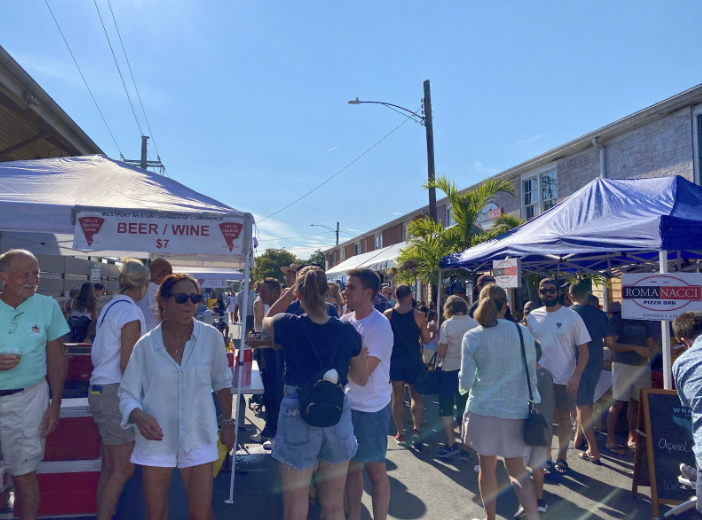 Crowds+gathered+throughout+the+festival+to+support+local+restaurants+and+taste+the+food+they+had+to+offer.