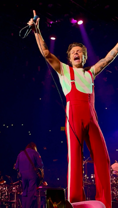 Harry Styles interacting with the crowd at Madison Square Garden while singing Adore You.