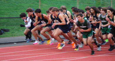 The varsity team starts their race