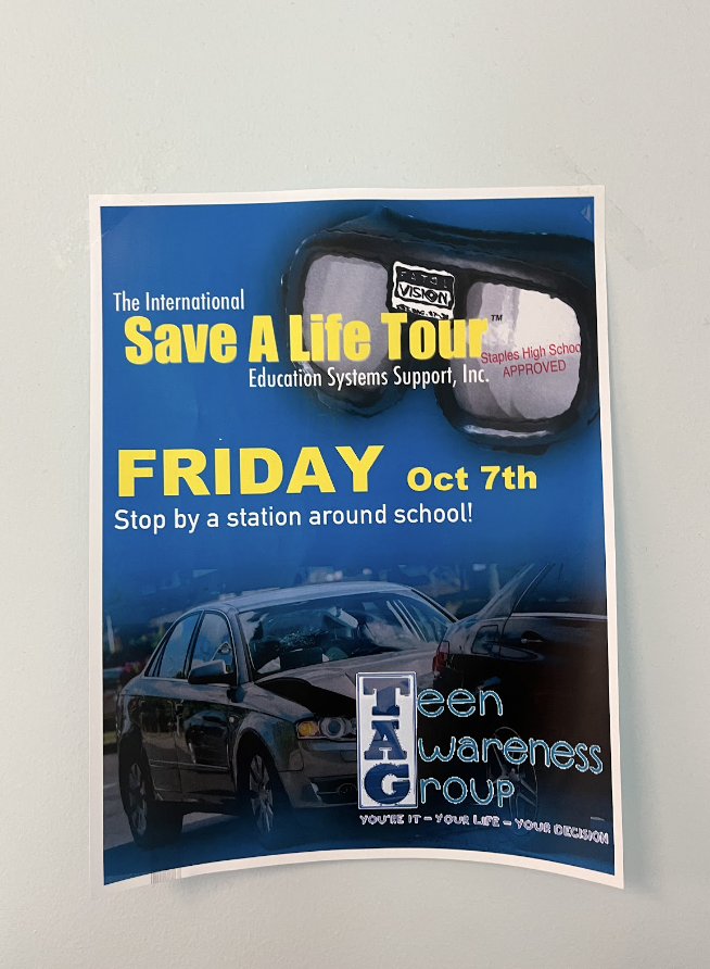 A Save A Life Tour flyer hangs on the walls of Staples high School. 
