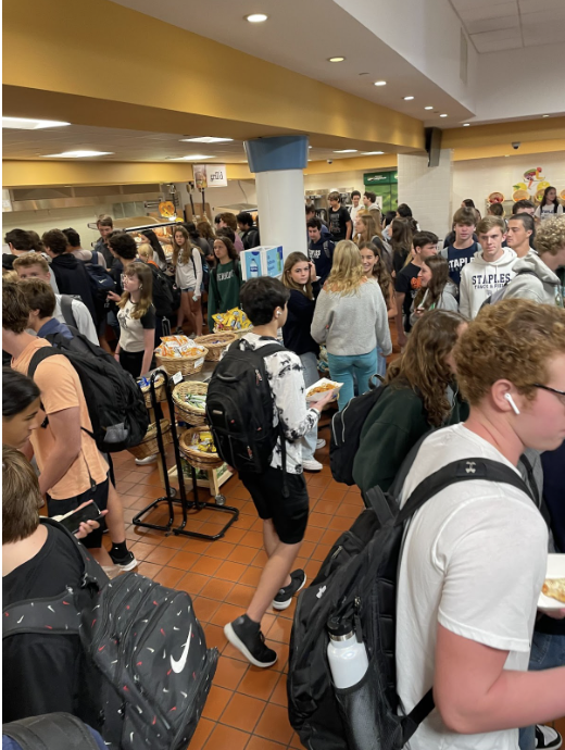 Staples students crowd in the cafeteria to get their food everyday