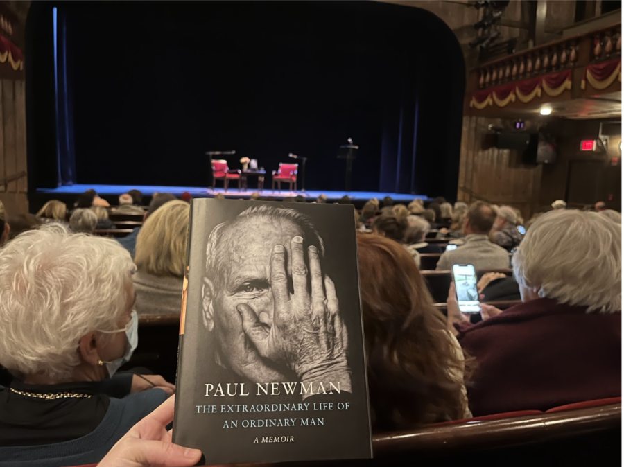 Melissa Newman speaks about her father’s new memoir on Nov. 20 at the Westport Country Playhouse. Event coordinators hand out a copy of the book to each attendee while they wait for the talk to begin.