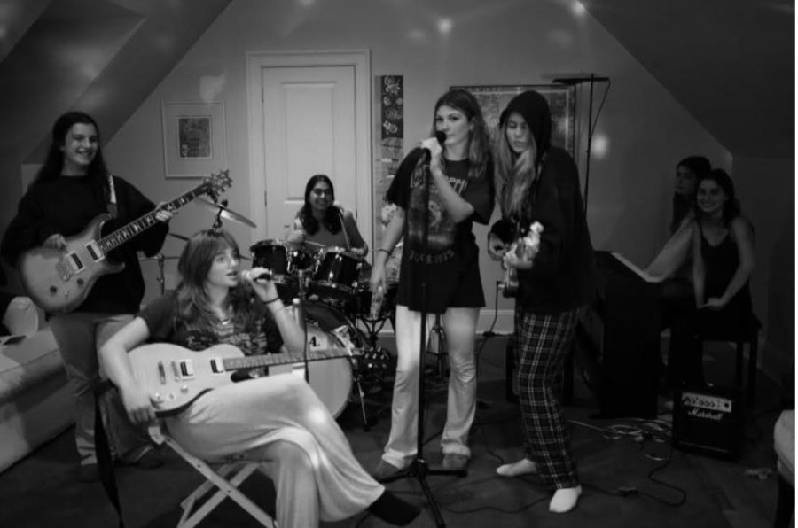 The Corduroys practice one of their covers in the same room their viral video was recorded in. 