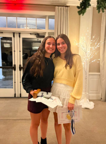 Kathryn Asiel ’24 and Sofia Fidalgo ’25 are announced as next seasons 2023 Staples girls varsity field hockey captains at the annual end of season banquet by coach Ian Tapsall. 