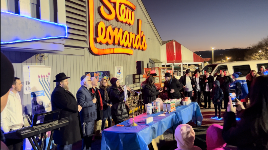 Fairfield County gathers around front of Stew Leonard’s for the first night of Hanukkah.
