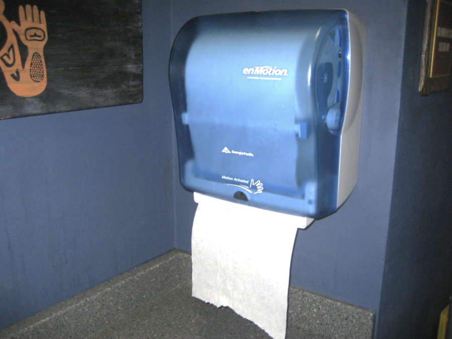 The Staples bathrooms were once filled with paper towel dispensers just like this one, until they recently vanished from our school walls. 