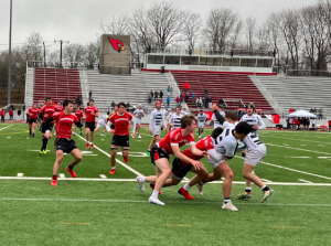 At the Greenwich Cardinal Stadium on Saturday, March 25, the Staples boys’ rugby team lost in a tough match against the Cardinals with a final score of 30-13.