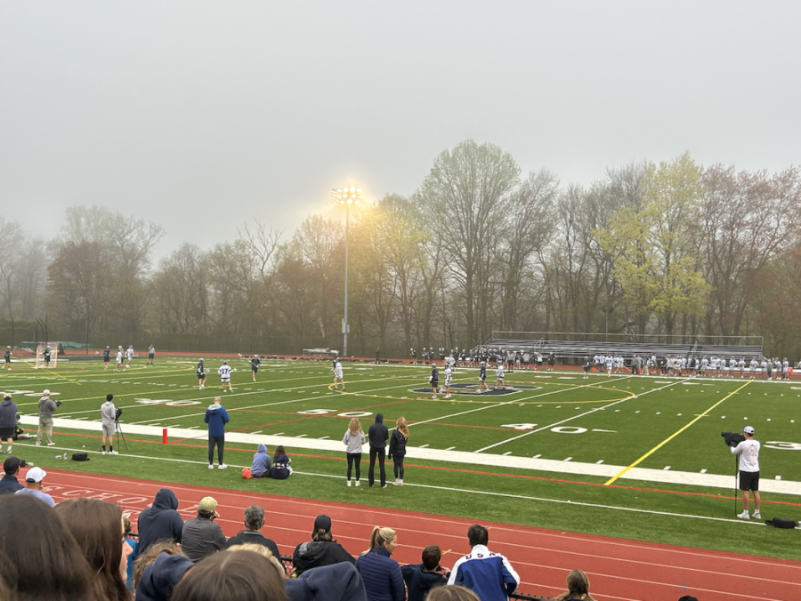 Students+and+parents+fill+up+the+bleachers%2C+showing+their+support+for+the+Staples+boys%E2%80%99+lacrosse+team+against+Darien.