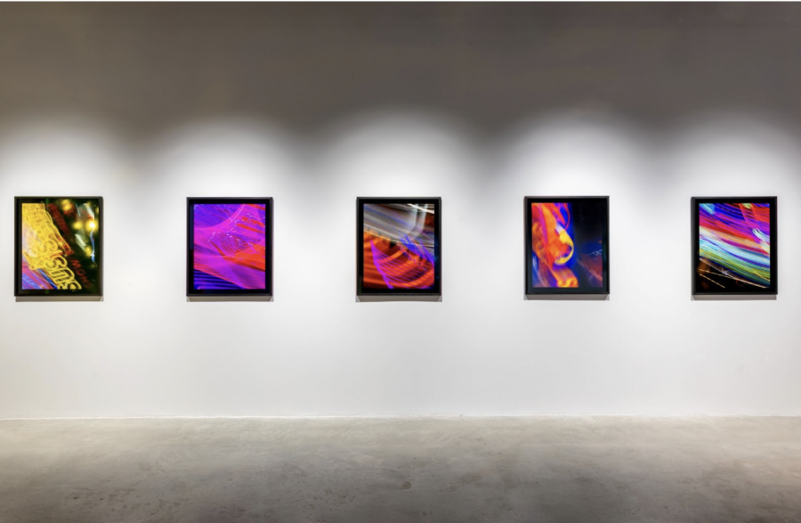 Reyle experimented with photography for the first time in his career. He uses neons to create a similar feeling as his infamous foil paintings. 