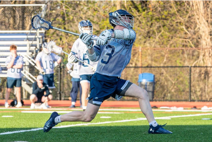 Ben Burmeister ’24 winds up for a shot against Massapequa late in the first half. 