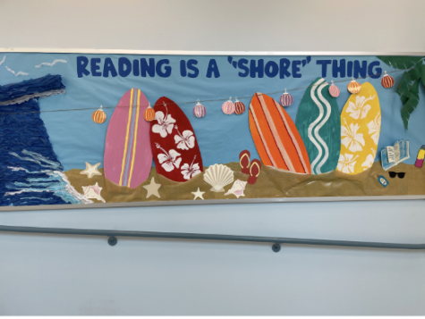 Staples librarians Jennifer Cirino and Nicole Moeller encourage students to find time to take part in summer reading. Both of them agree that the beach is their favorite place to read over the summer. 

