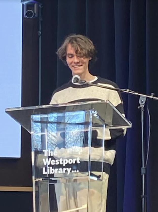 Darden reads his essay aloud for an audience at the Westport Public Library. His piece centers around his experience coming to terms with his sexuality.