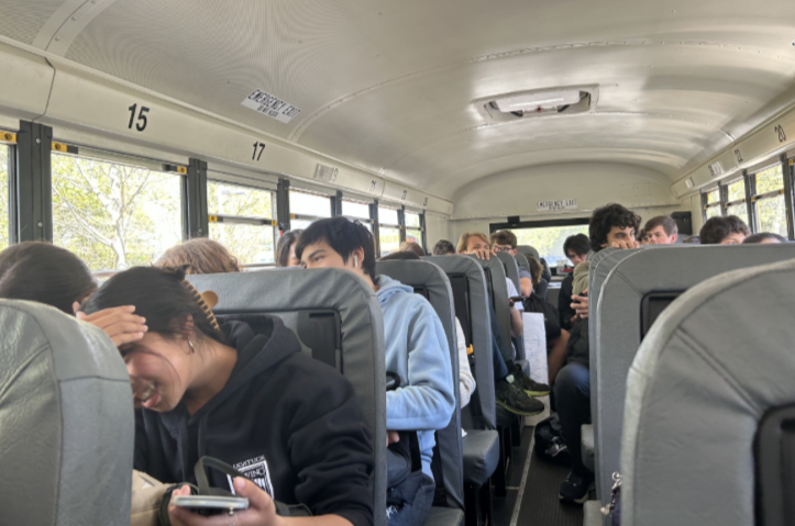 Photo by Rylie Cordella ’25. 
Bus two seats overflow with students on their way home or to various areas in town. 