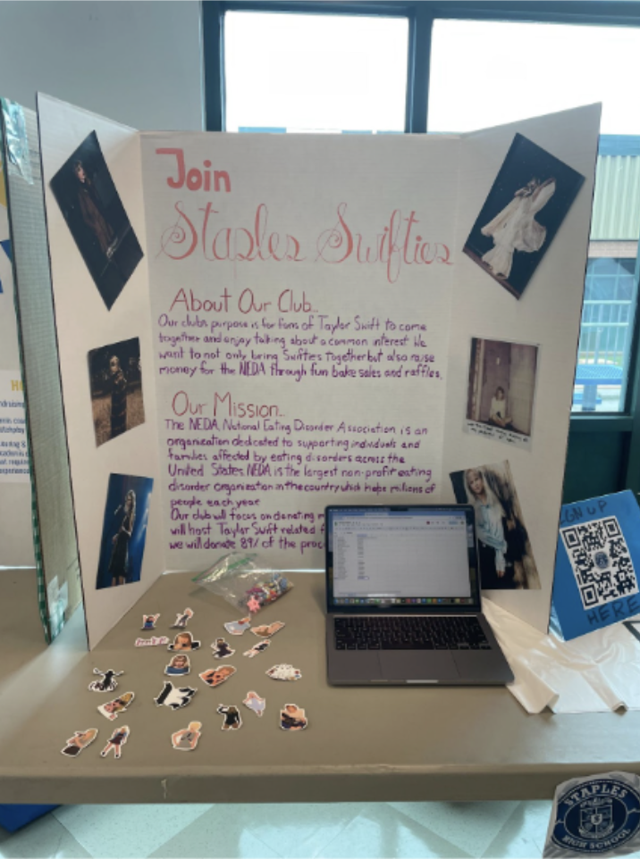 During club rush, the Staples Swifties club shows their poster in an effort to attract members. 